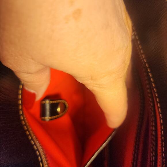 Dooney & Bourke Saffiano Tassel Bucket Tote Bag in black with tan trim - Picture 12 of 16